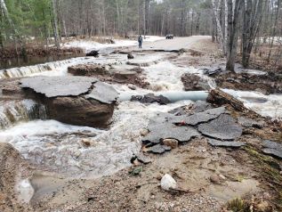 Hughes Landing Road on Monday afternoon